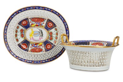 Lot 493 - A CHINESE FAMILLE ROSE ARMORIAL RETICULATED...