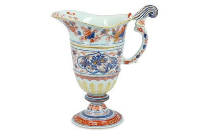 Lot 440 - A CHINESE IMARI HELMET-SHAPED EWER. Qing...