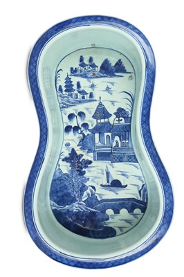 Lot 442 - A CHINESE BLUE AND WHITE BIDET. Qing Dynasty,...