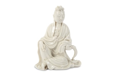 Lot 318 - A SMALL CHINESE BLANC-DE-CHINE FIGURE OF...