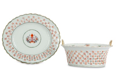 Lot 497 - A CHINESE FAMILLE ROSE ARMORIAL RETICULATED...