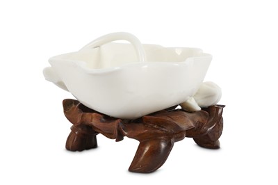 Lot 238 - A CHINESE BLANC DE CHINE ‘LOTUS’ BRUSHWASHER....