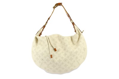 Lot 557 - Louis Vuitton Cream Onatah GM, c. 2007,...