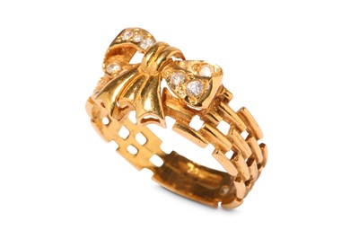 Lot 315 - A bow ring, set with imitation diamonds, ring...