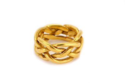 Lot 326 - A band ring, of openwork interwoven design,...