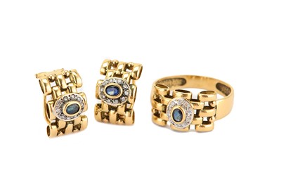 Lot 344 - A gem-set ring and pair of earrings, each set...