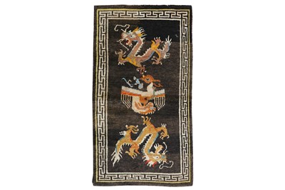 Lot 20 - AN UNUSUAL TIBETAN RUG approx:5ft.3in. x...