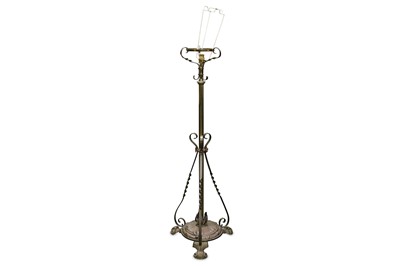 Lot 345 - An Arts and Crafts brass extending standard...