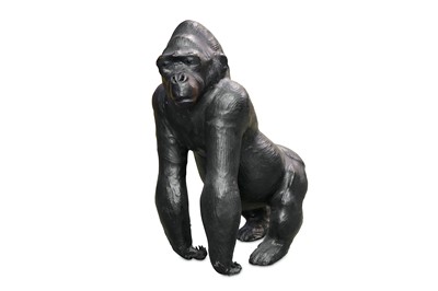 Lot 106 - A  MID 20TH CENTURY LEATHER COVERED MODEL OF A...
