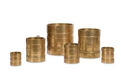 Lot 4 - A SET OF EARLY 20TH CENTURY BRONZE MEASURES...