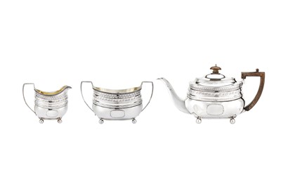 Lot 482 - A George III sterling silver three-piece tea service, London 1807, the teapot by Thomas Wallis II (reg. 15th Sep 1792)
