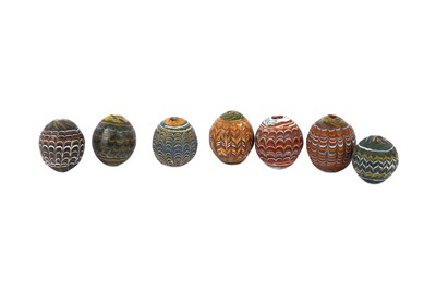 Lot 328 - SEVEN VERY LARGE CORE-FORMED GLASS BEADS Each...