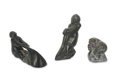 Lot 315 - THREE ESKIMO STONE FIGURES Mid-20th Century...