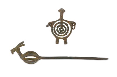 Lot 331 - TWO LURISTAN BRONZES Including a pin, with an...