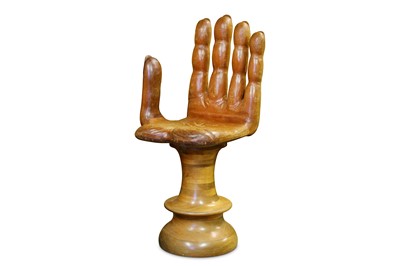 Lot 107 - A 1960'S CARVED HARDWOOD SWIVEL CHAIR MODELLED...