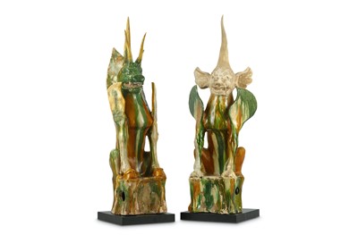 Lot 478 - A PAIR OF TANG DYNASTY CHINESE SANCAI EARTH SPIRITS.