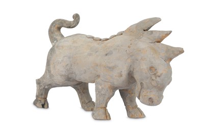 Lot 461 - A CHINESE POTTERY FIGURE OF A MYTHICAL BEAST / THREE CHINESE POTTERY FIGURES