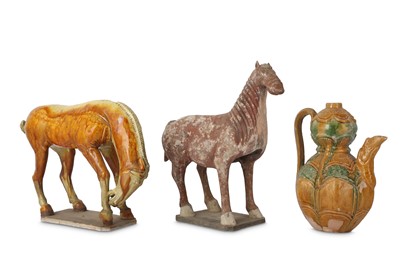 Lot 413 - TWO CHINESE POTTERY FIGURES OF HORSES.