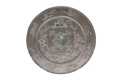 Lot 994 - A CHINESE BRONZE SILVERED MIRROR.