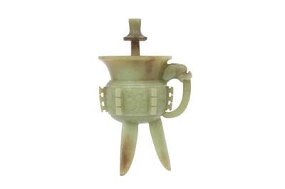 Lot 531 - A CHINESE PALE CELADON JADE ARCHAISTIC VESSEL, JUE.