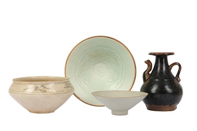 Lot 585 - A CHINESE BLACK AND BROWN-SPLASHED EWER.