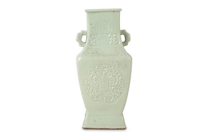 Lot 336 - A CHINESE CELADON-GLAZED MOULDED VASE.