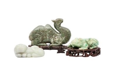 Lot 692 - THREE CHINESE JADE AND JADEITE ANIMAL CARVINGS.