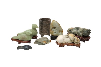 Lot 634 - A CHINESE PALE CELADON JADE BOULDER.