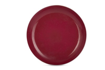 Lot 33 - A CHINESE RUBY-GLAZED DISH.