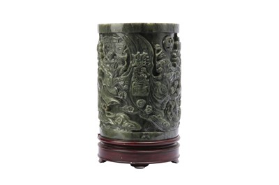 Lot 675 - A CHINESE SPINACH-GREEN JADE BRUSH POT, BITONG.