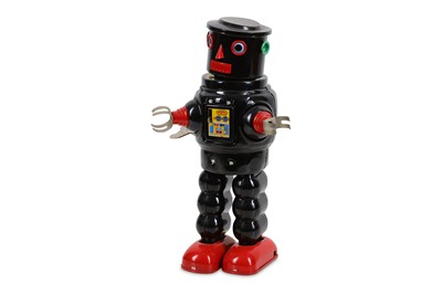 Lot 48 - A TIN PLATE CLOCKWORK ROBOT BY KO JAPAN...