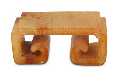 Lot 489 - A CHINESE CREAM JADE BRUSH REST