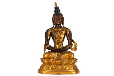 Lot 440 - A CHINESE GILT-BRONZE FIGURE OF A BUDDHA.