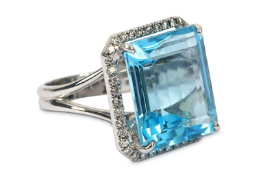Lot 193 - A blue topaz and diamond ring, the...