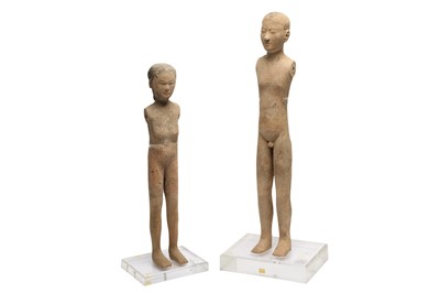 Lot 219 - A PAIR OF CHINESE CEREMONIAL POTTERY FIGURES.