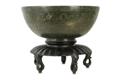 Lot 558 - A CHINESE SPINACH JADE 'LONGEVITY' BOWL.