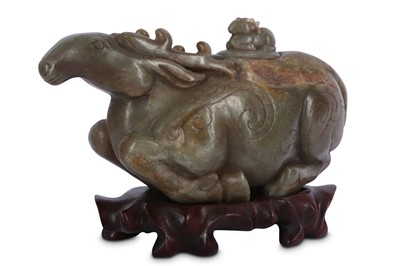Lot 256 - A CHINESE PALE CELADON JADE ARCHAISTIC 'STAG' VESSEL AND COVER.