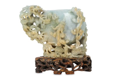 Lot 352 - A CHINESE PALE CELADON JADE 'DRAGON' BRUSH WASHER.