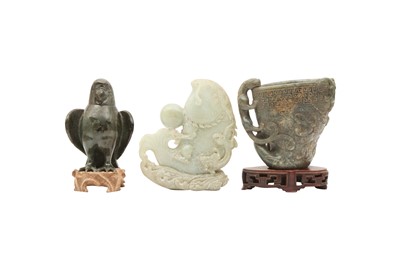 Lot 515 - TWO CHINESE GREEN JADE VESSELS AND A 'CARP' CARVING.