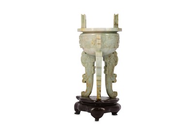 Lot 495 - A CHINESE APPLE-GREEN JADEITE DING