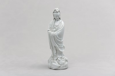 Lot 704 - A CHINESE BLANC-DE-CHINE FIGURE OF GUANYIN.