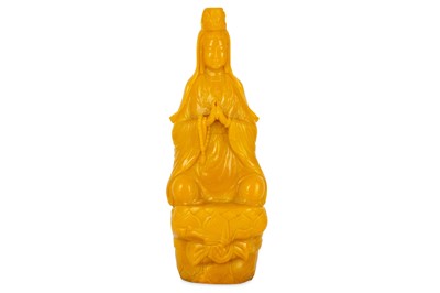 Lot 544 - A CHINESE BEIJING YELLOW  GLASS FIGURE OF GUANYIN.