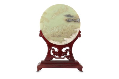 Lot 126 - A CHINESE PALE CELADON JADE CIRCULAR 'IMMORTALS' TABLE SCREEN.