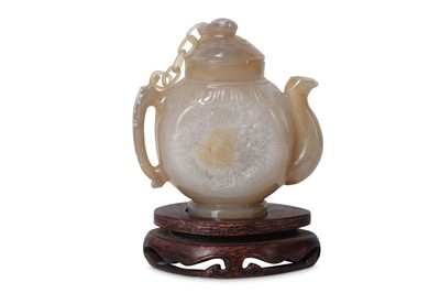 Lot 553 - A CHINESE AGATE TEAPOT AND COVER.