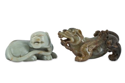 Lot 174 - TWO CHINESE JADE CARVINGS OF LIONS.