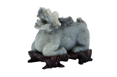 Lot 502 - A CHINESE GREY JADE CARVING OF A QILIN