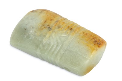 Lot 659 - A CHINESE PALE CELADON JADE ARCHAISTIC BLADE.