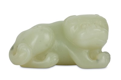 Lot 667 - A CHINESE WHITE JADE 'DOG' CARVING.