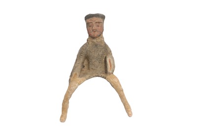 Lot 221 - A CHINESE POTTERY FIGURE OF A RIDER.