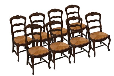 Lot 330 - A set of eight French rustic oak ladder back...